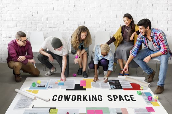 coworking space, employees in group discussion